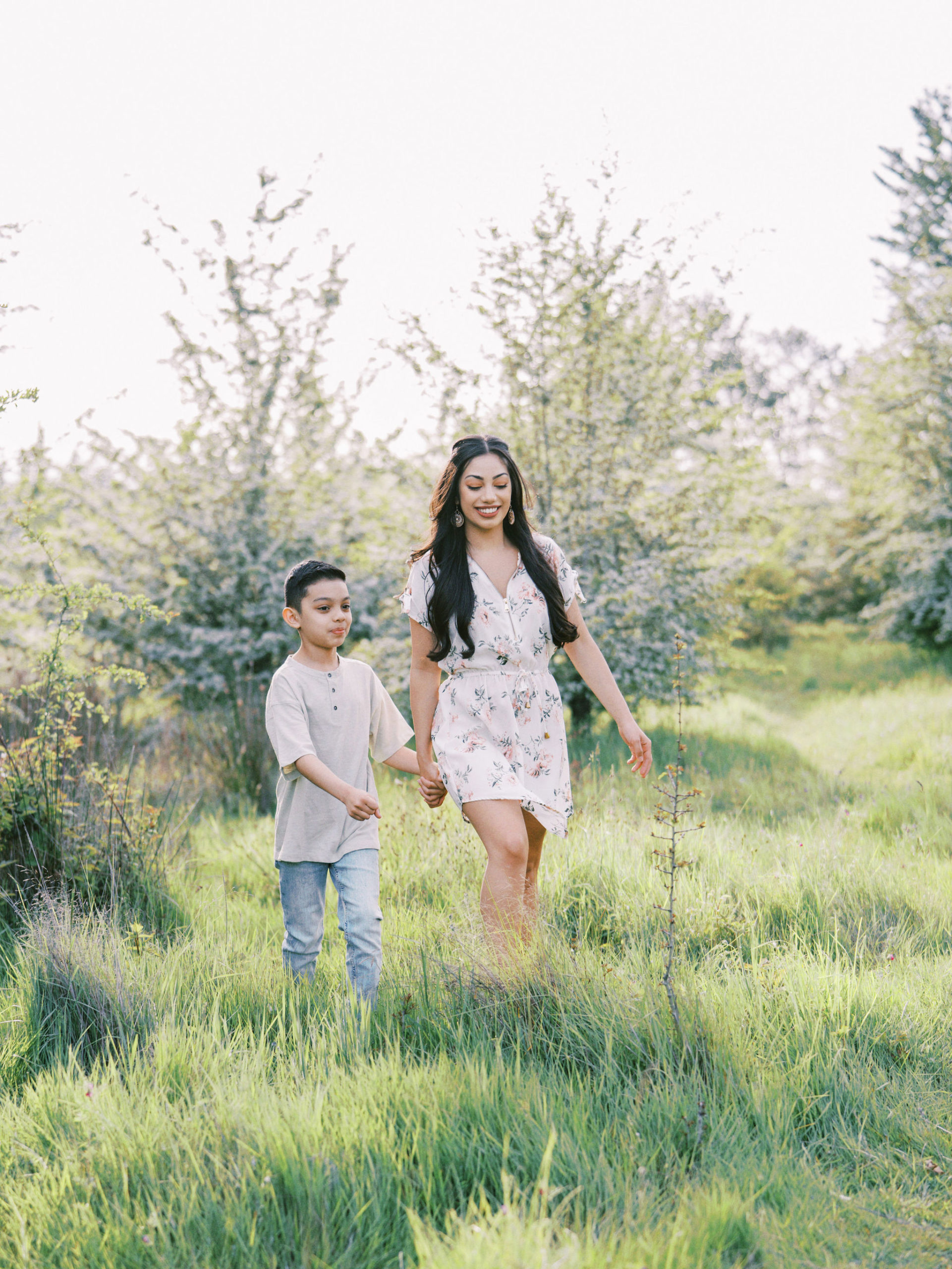 Mother and son walking in the park in Seattle