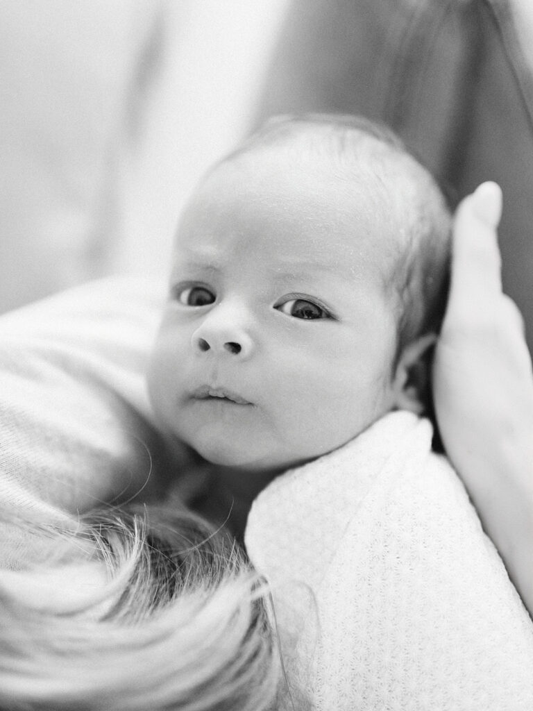 black and white image of newborn baby during newborn session by seattle newborn photographer Tanya Zagumenov