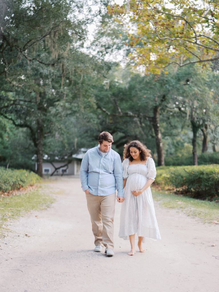 Mom and partner walking, captured by Seattle maternity photographer Tanya Zagumenov