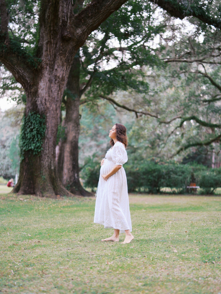 Wide shot of mom to be, getting her maternity photos done in Seattle.